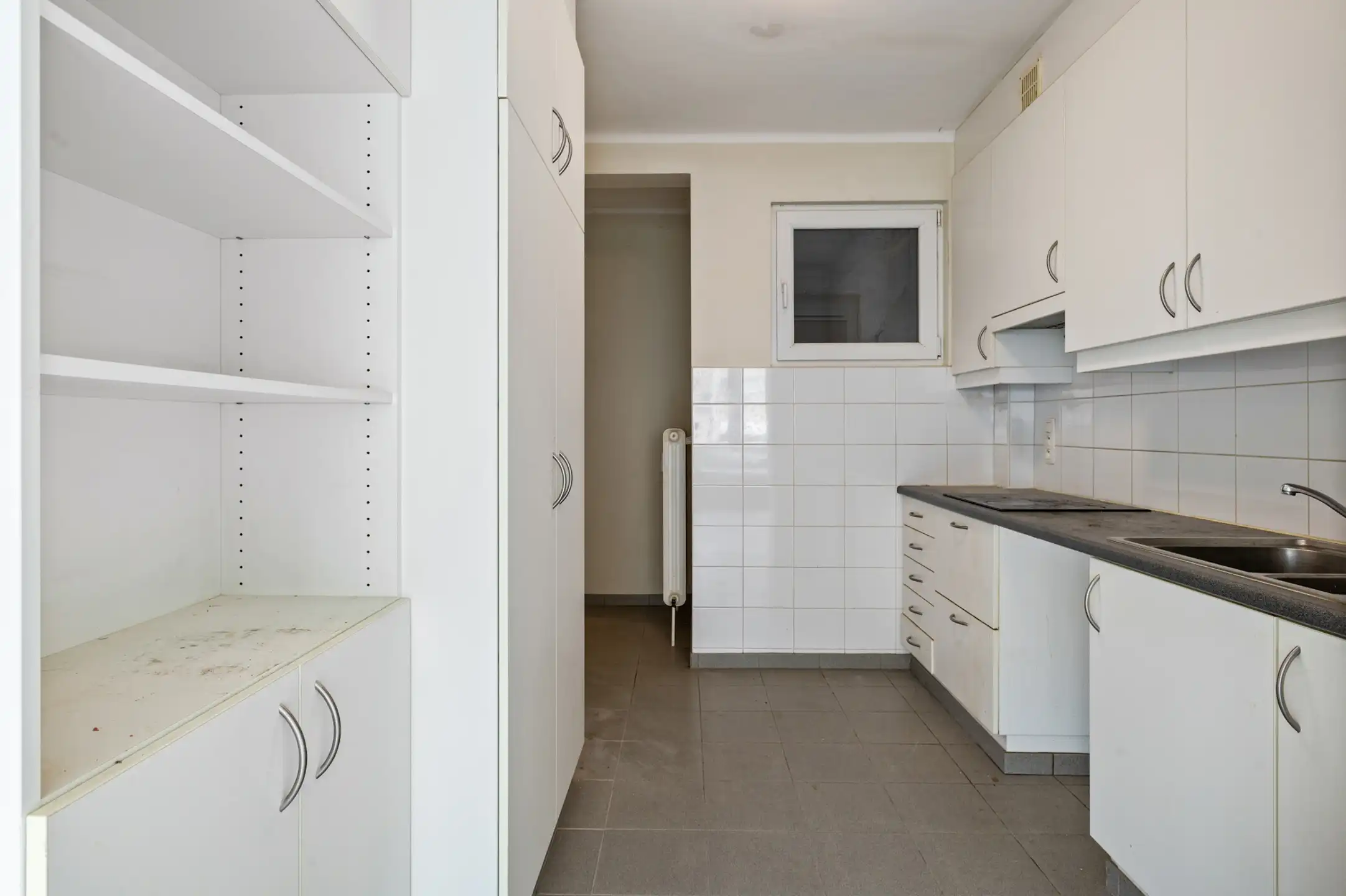 Te renoveren gelijkvloersappartement met terras foto 8