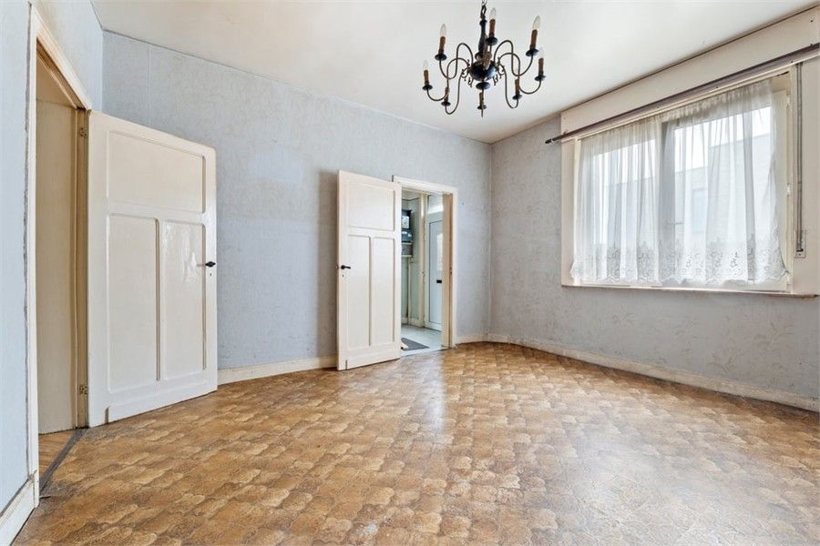 TE RENOVEREN GEZINSWONING MET LOODS IN HET LANDELIJKE GINGELOM foto 12