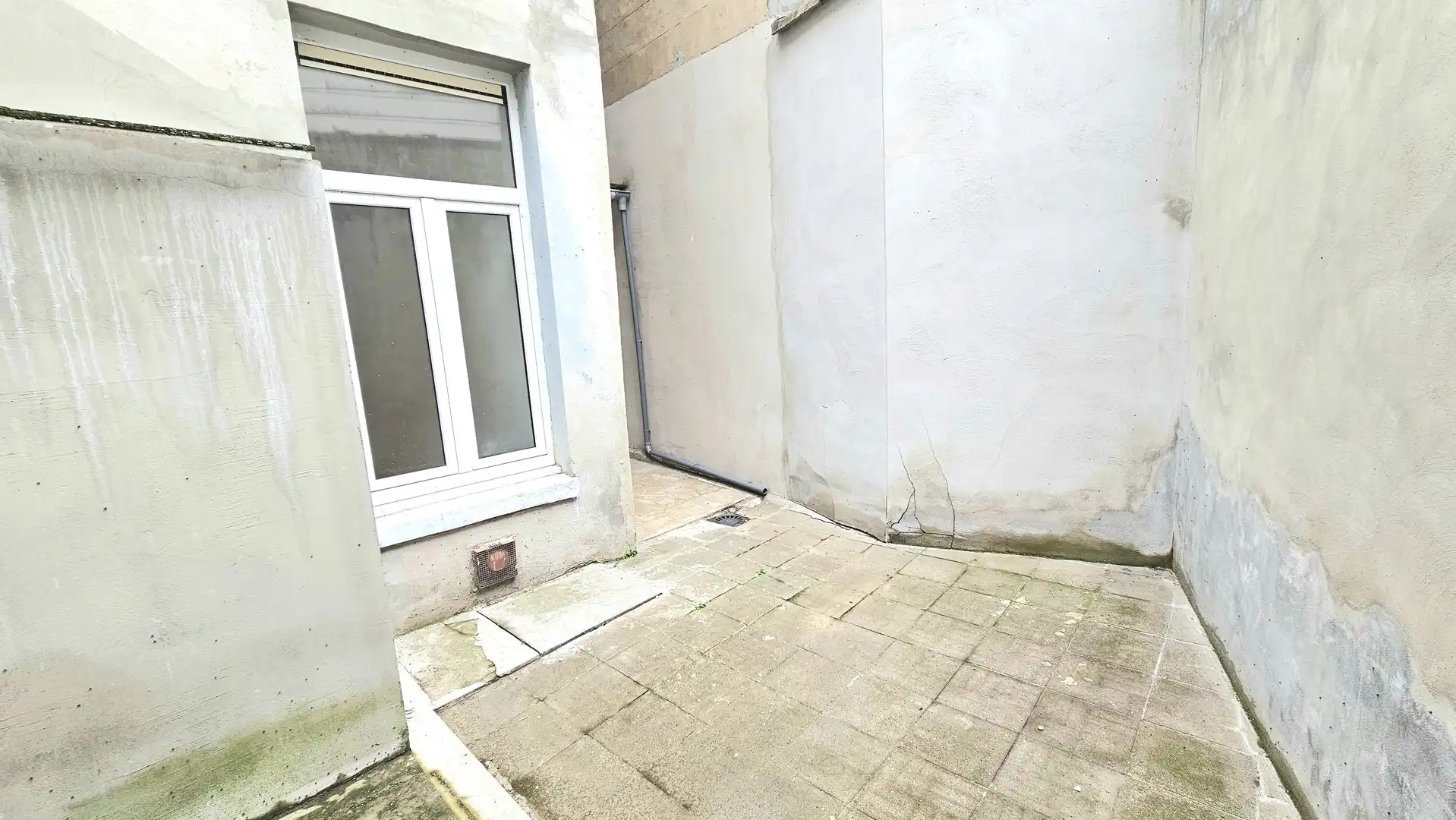 Appartement op het gelijkvloers met koer foto 11