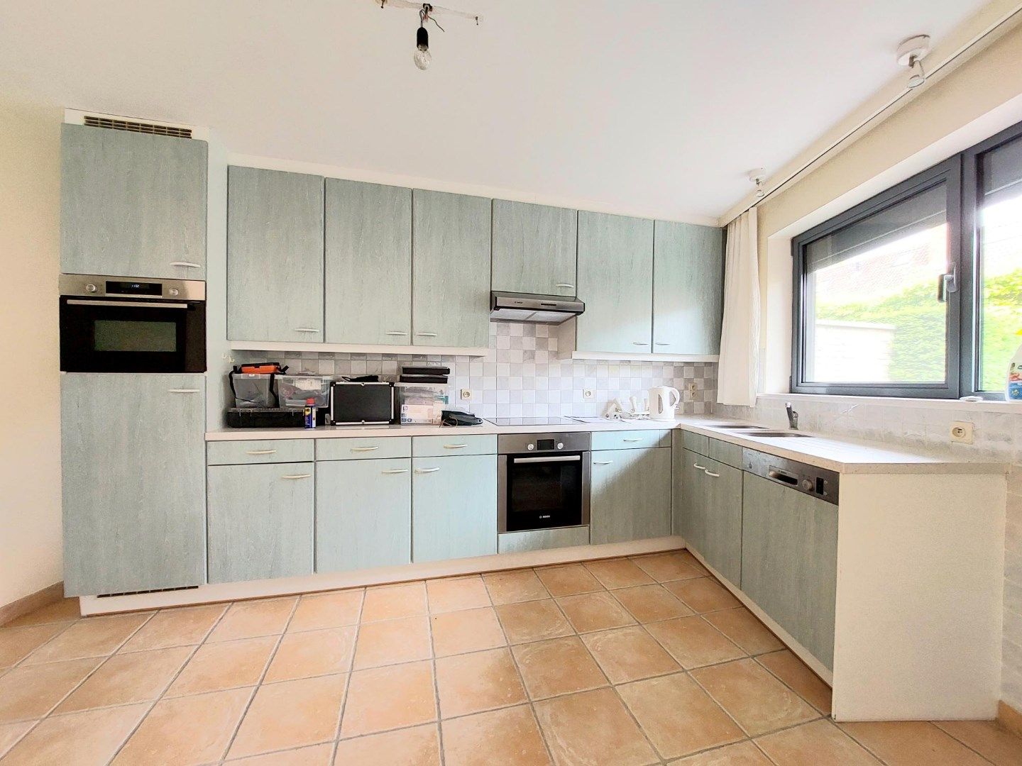 Ruime rustig gelegen stadswoning met tuin en garage foto 4