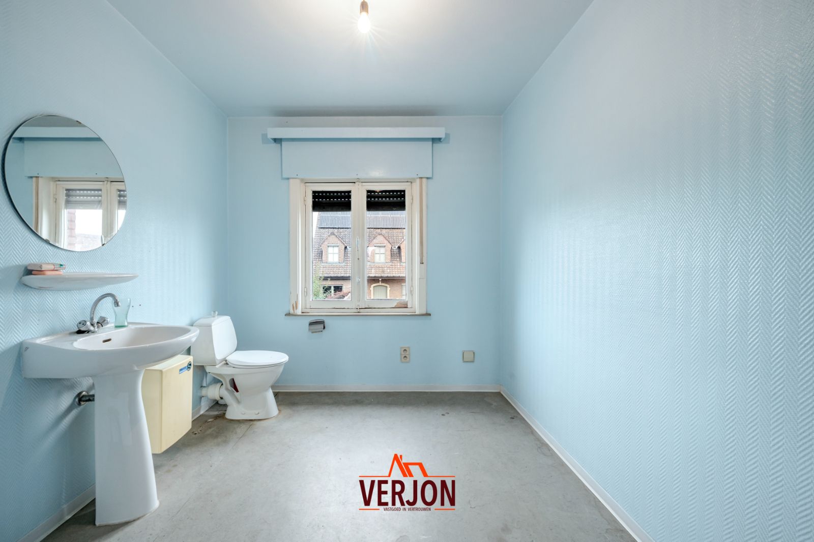 Woning met tuin en garage in het centrum van Ardooie! foto 13