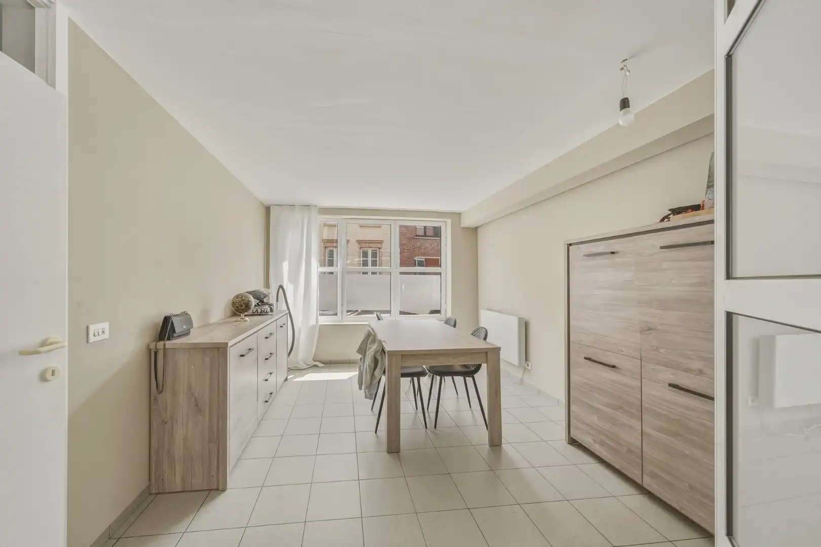 Verhuurd appartementsgebouw met 3 woonentiteiten foto 5
