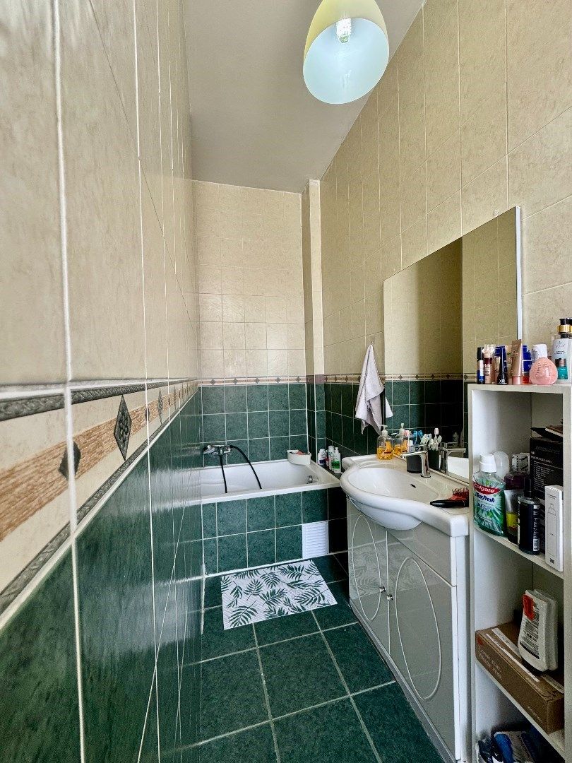 Licht en ruim 2-slaapkamerappartement te koop in Laken foto 24
