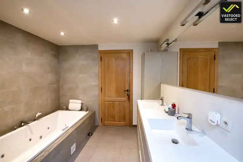 Halfopen bebouwing met 4 slaapkamers, zuidgerichte tuin en landelijk uitzicht in Sint-Laureins foto 10