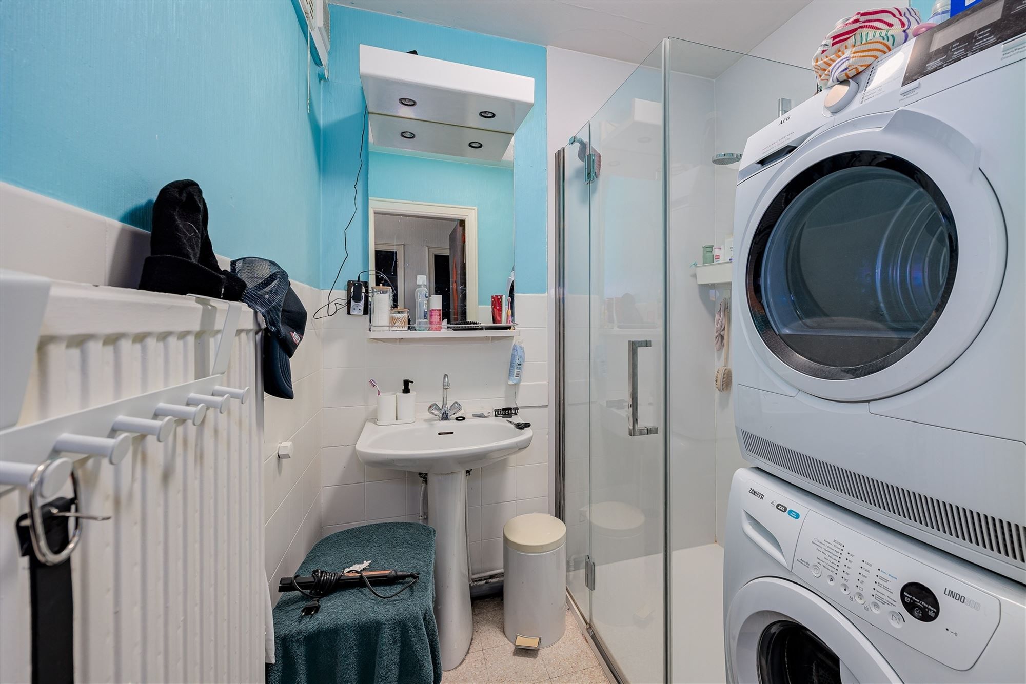 Vergund betonnen opbrengsteigendom met 3 appartementen + garagebox foto 21