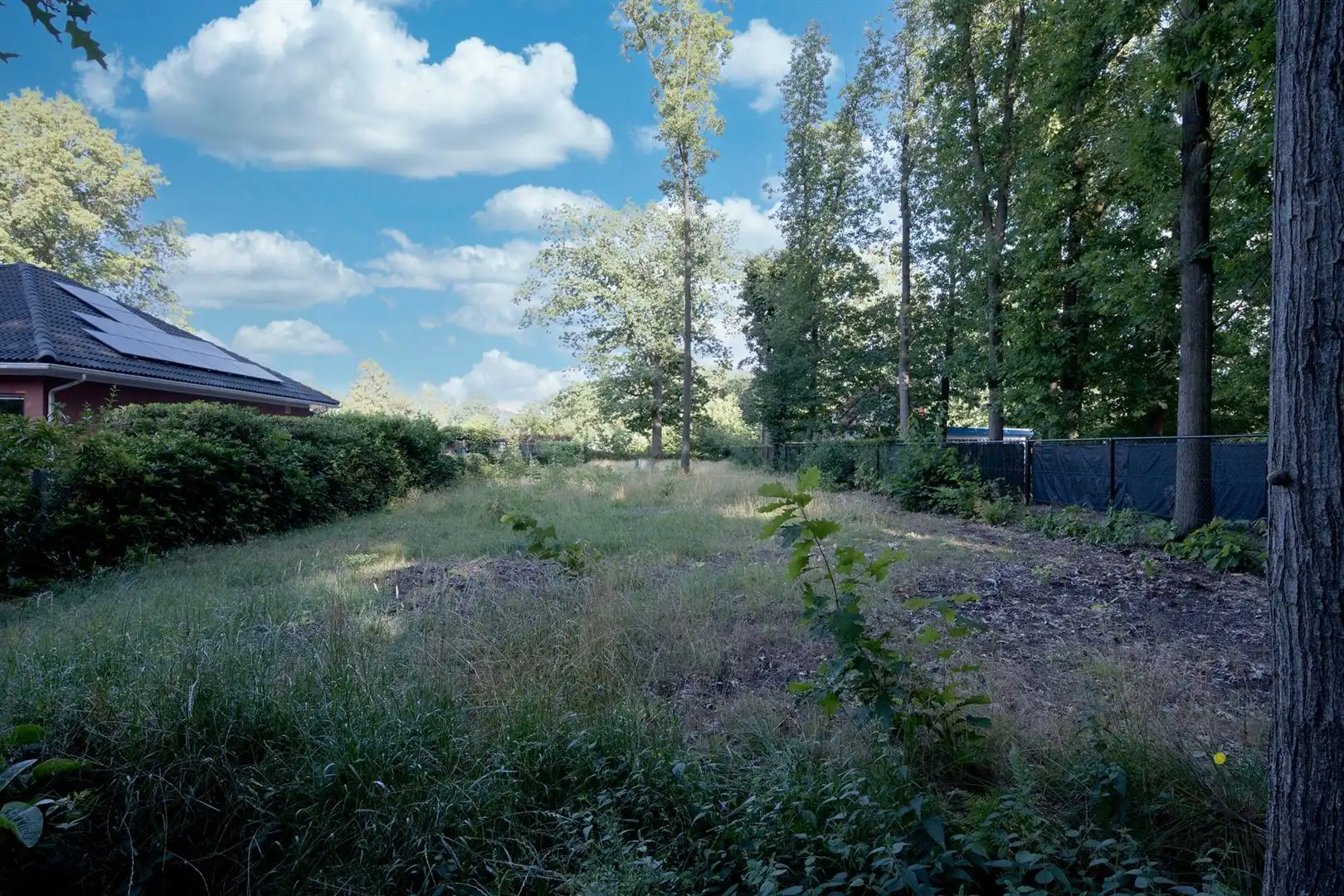 Rustig gelegen bouwgrond van 1.035 m² in het groene Voorkensheide! foto {{pictureIndex}}