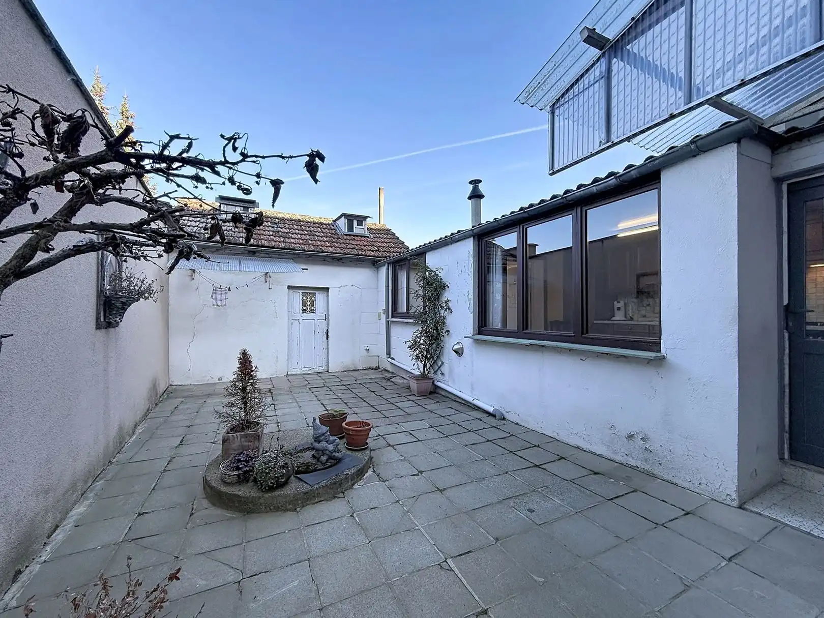Op te frissen woning met binnenkoer, tuin, 3 slpks foto 5