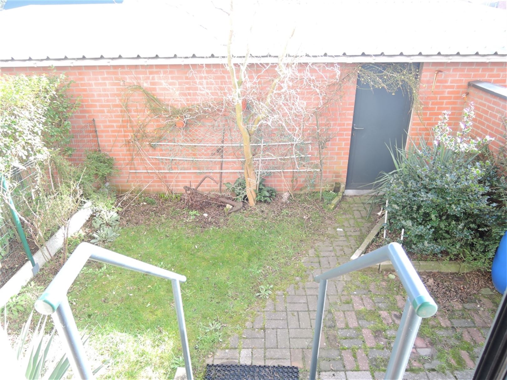 Gelijkvloers appartement met garage box foto 14