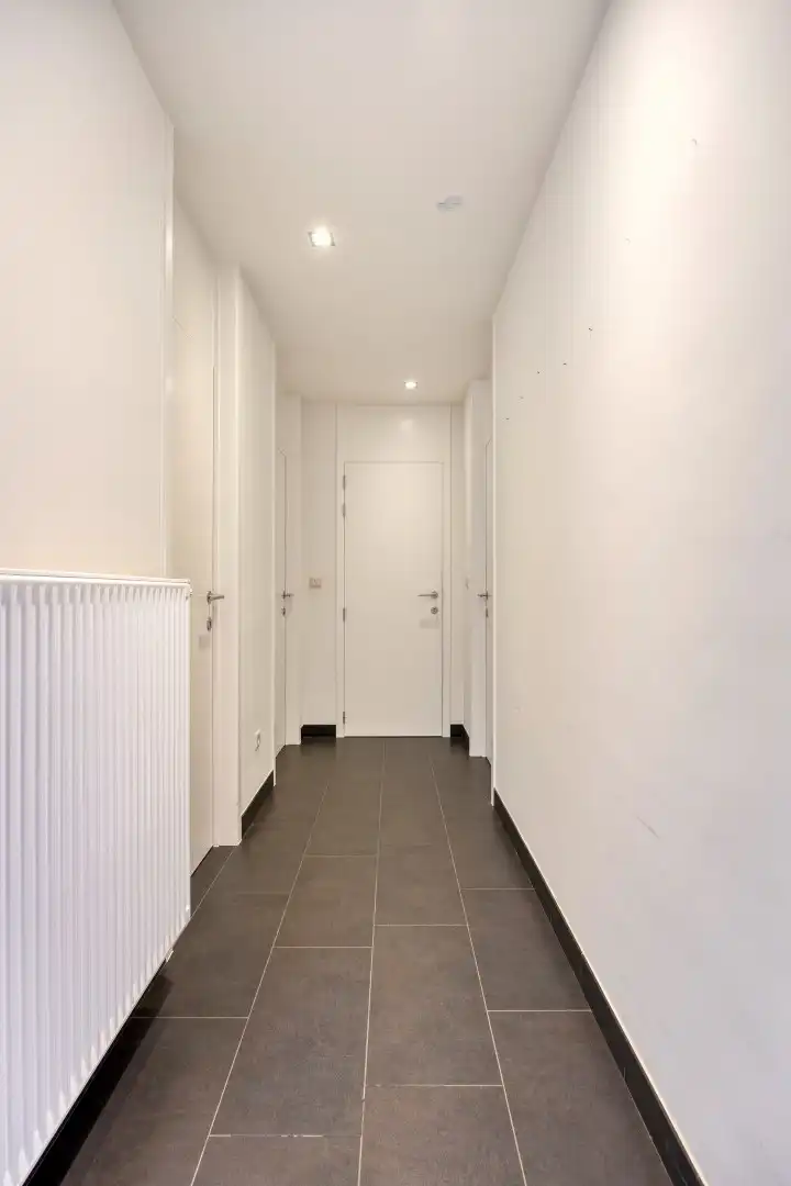 Unieke opbrengsteigendom met commercieel gedeelte en 2 ruime appartementen !  foto 11