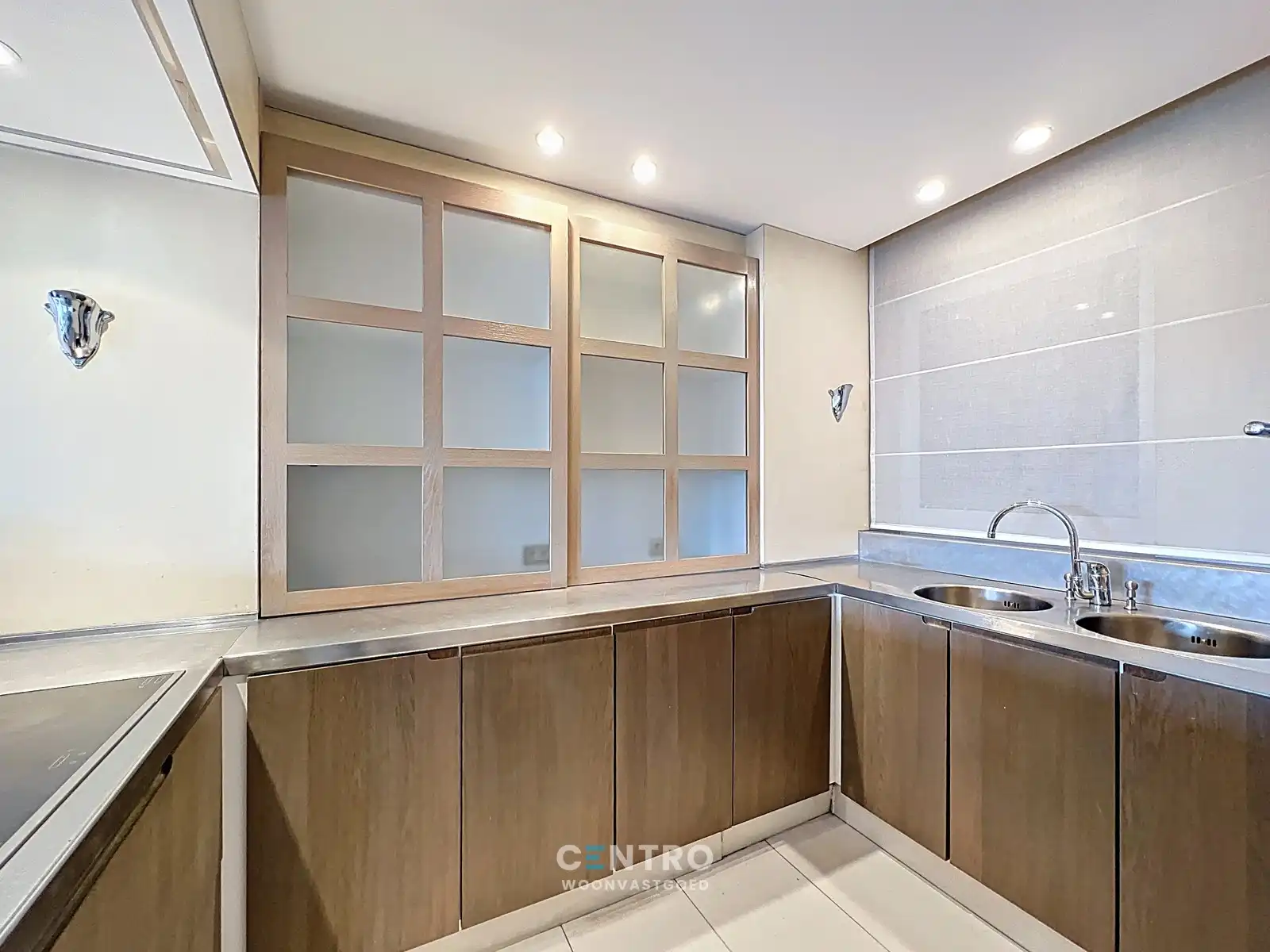 Appartement op AAA-locatie: ruim (127m²), ZONNIG doorloopappartement op de Grote markt (o.a. 2 slpk, dressing, 2 badk, 2 terrassen). foto 17