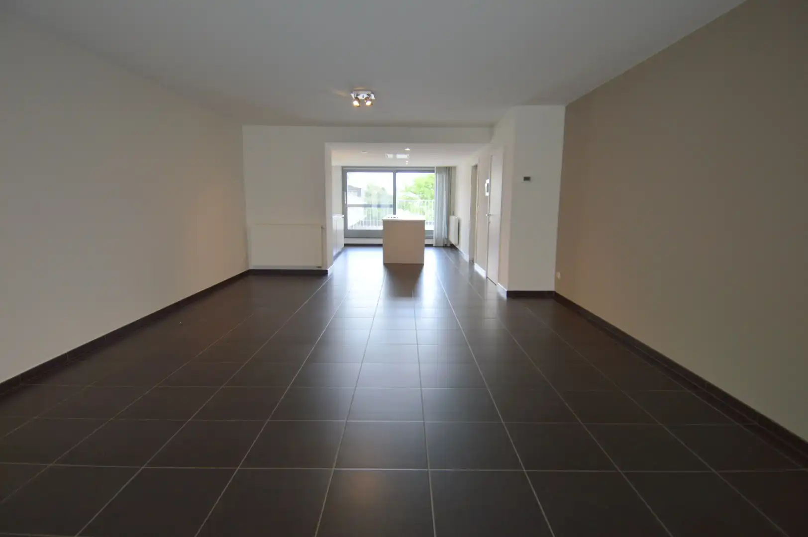 Ruim appartement met 2 slaapkamers, 2 terrassen én garage in het centrum van Harelbeke foto 8