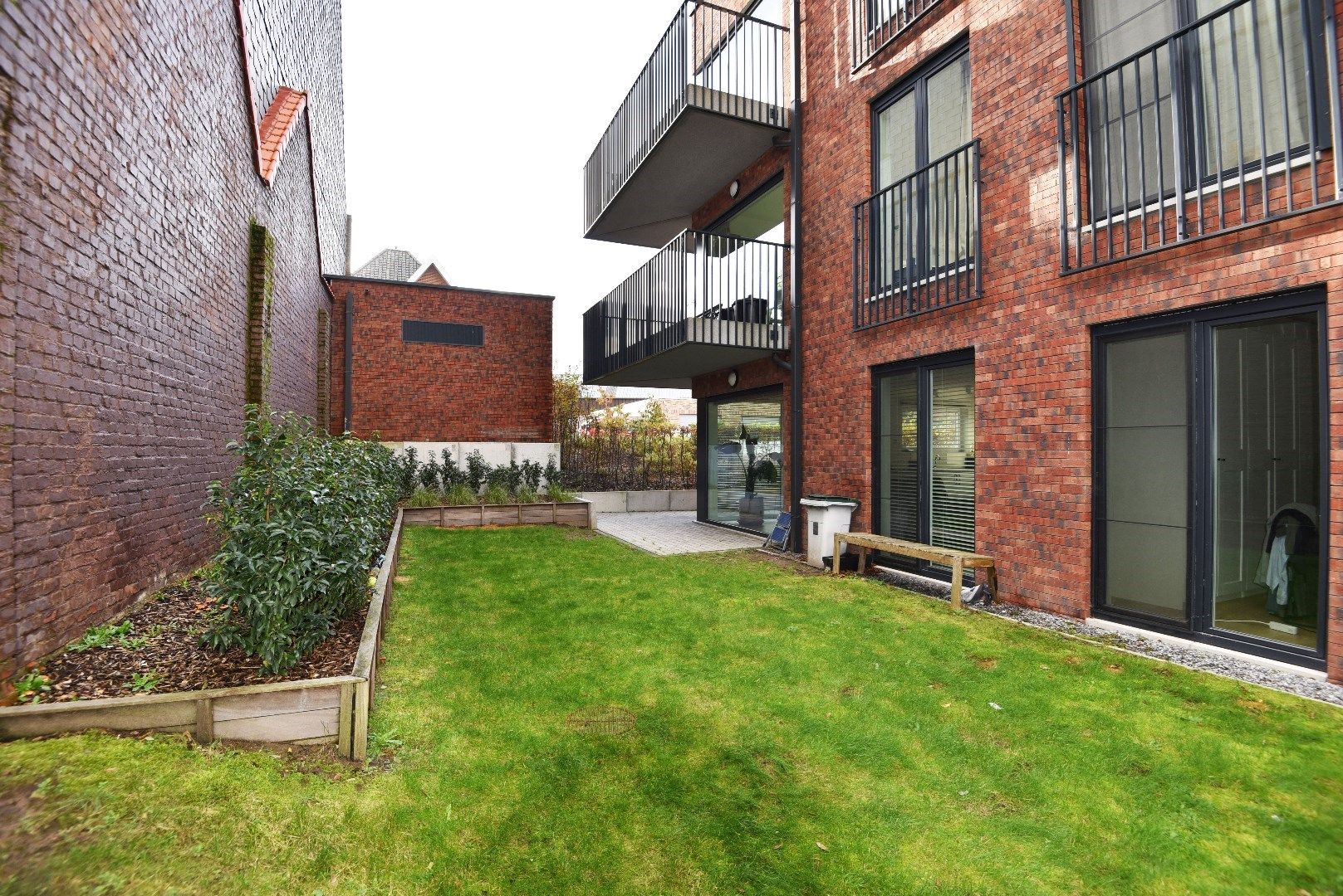 Gelijkvloers appartement met 2 slaapkamers en zonnige tuin te Maldegem centrum. foto 11