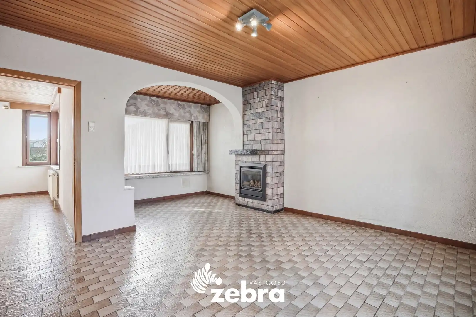 Op te frissen woning met veel potentieel, tuin en garage nabij het centrum van Tielt! foto 2