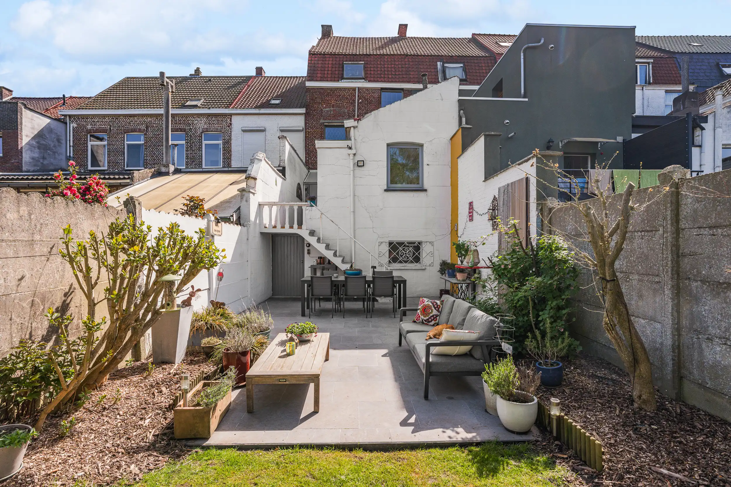 Charmante woning met diepe tuin én achteruitgang in centrum foto 15