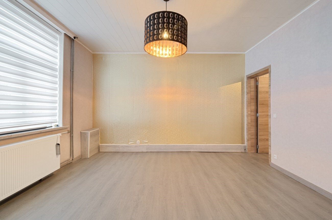 Ruime woning met tuintje en terras. foto 11
