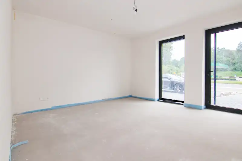 Ruim gelijkvloers nieuwbouwappartement met 4 slaapkamers en 2 badkamers, ruim terras en een mooie tuin op een goed bereikbare locatie! foto 11