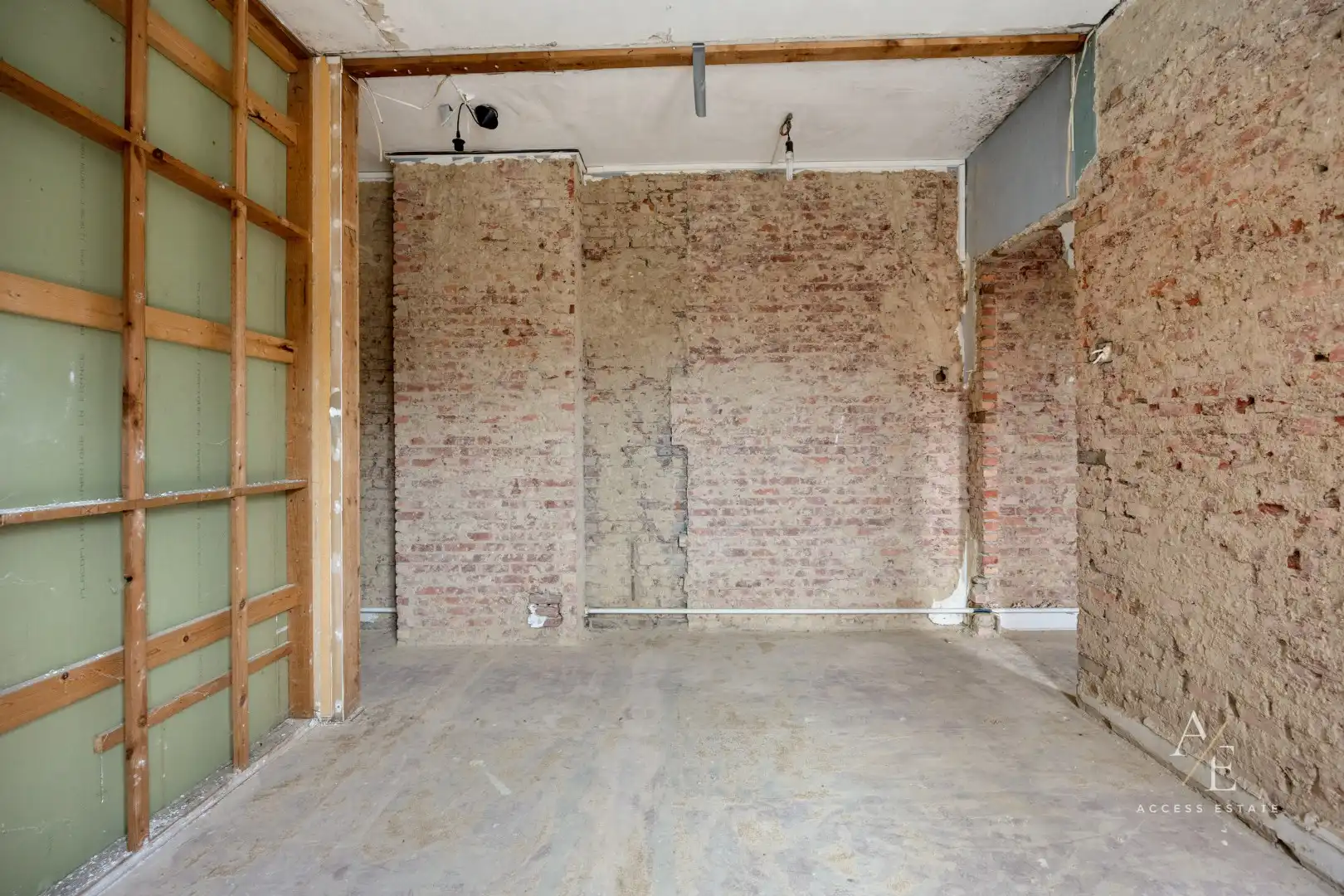 Veelzijdig te renoveren eigendom met tuin en 2 garages en achterdoorgang in Temse foto 14