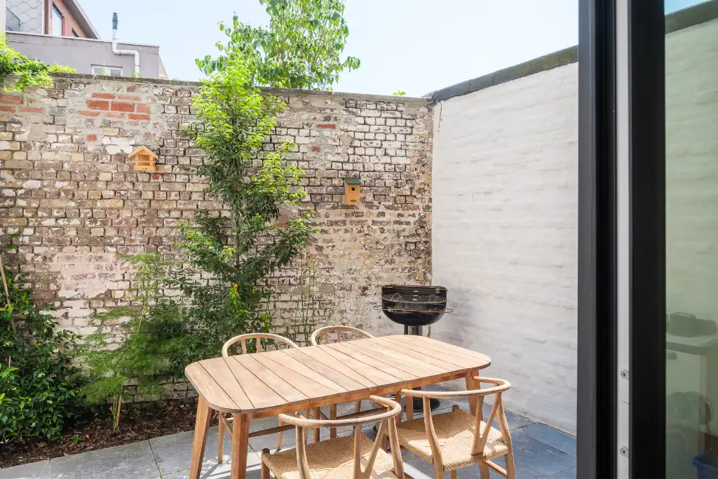 Uniek gerenoveerde, instapklare woning op fietsafstand van het stadscentrum met aangename buitenruimtes (terras en stadstuin) en 3 volwaardige slaapkamers. foto 20