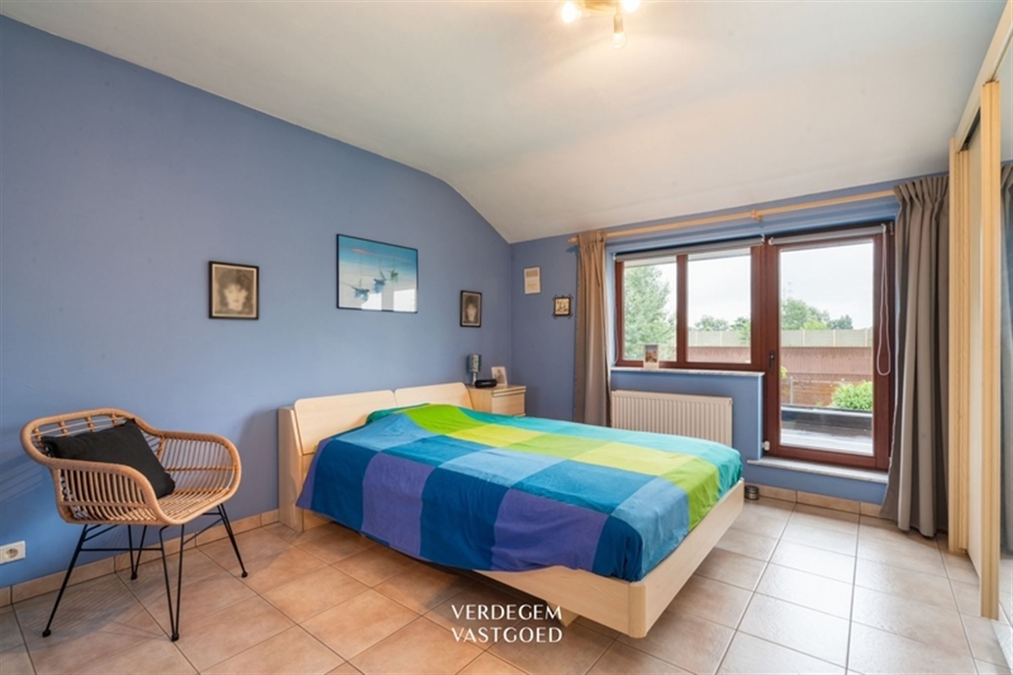 Instapklare woning met 3 slaapkamers, carport en fijne tuin foto 9