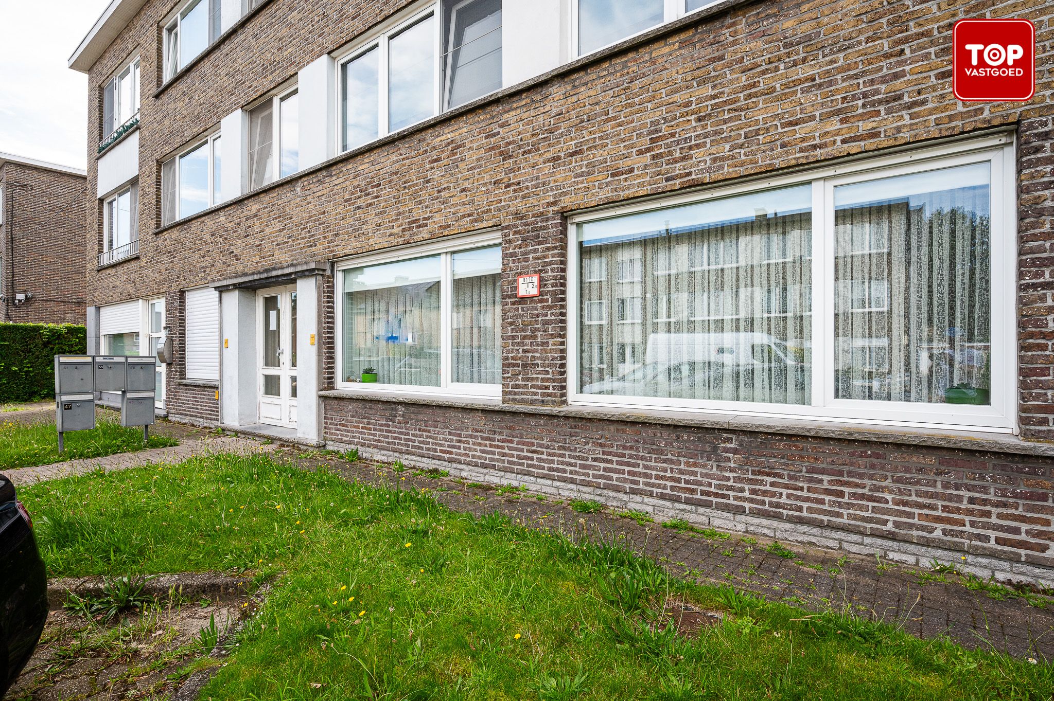 Vernieuwd gelijkvloers appartement met garage foto 25