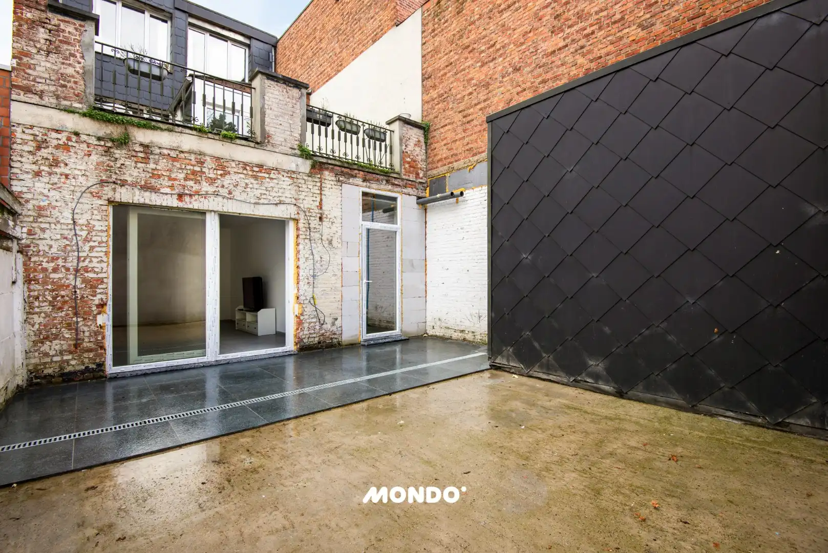 Commercieel gelegen opbrengsteigendom met handelsgelijkvloers, appartement en studio in het centrum van Willebroek! foto 14