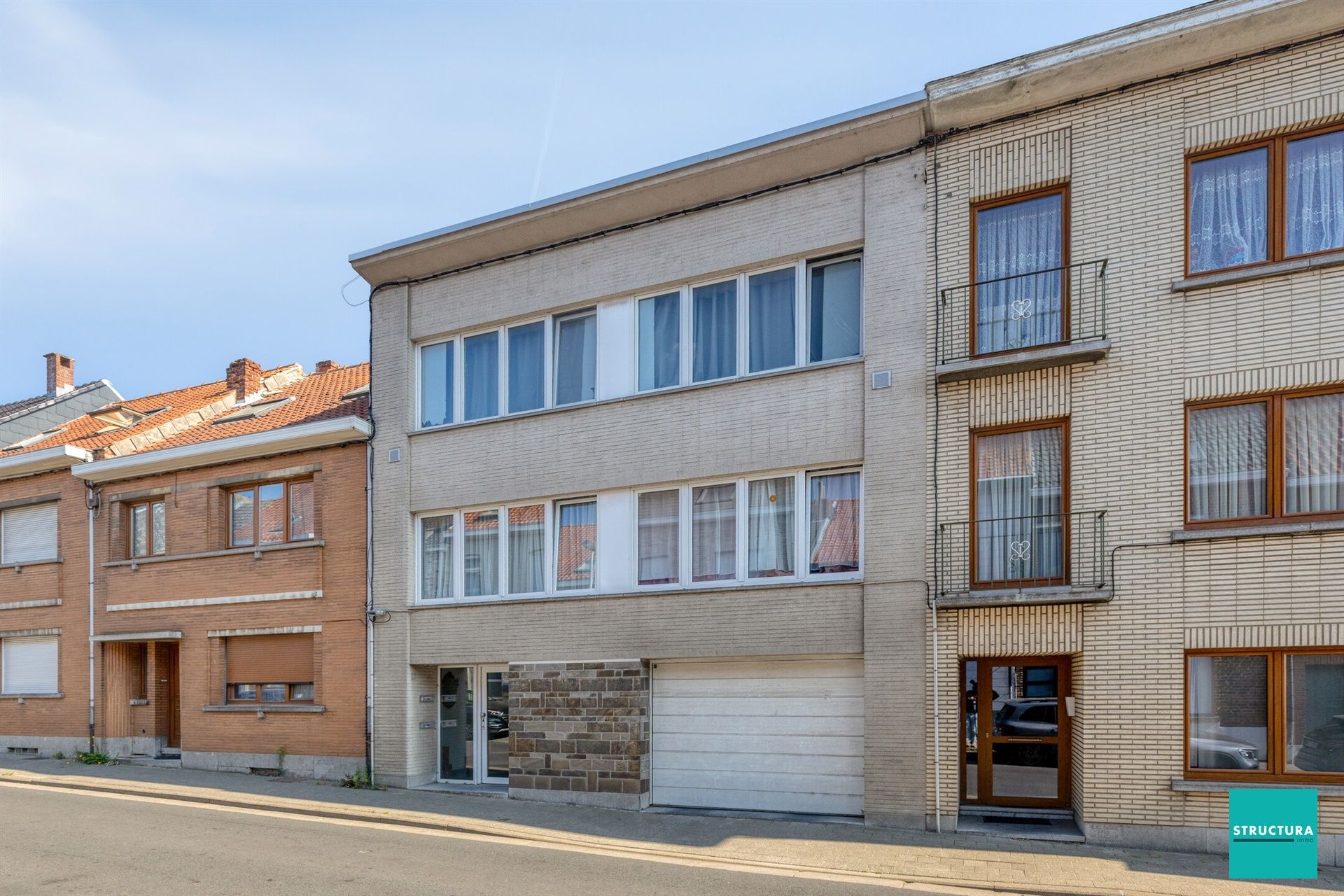 Opbrengsteigendom met 2 appartementen + 6 autostallingen foto 2
