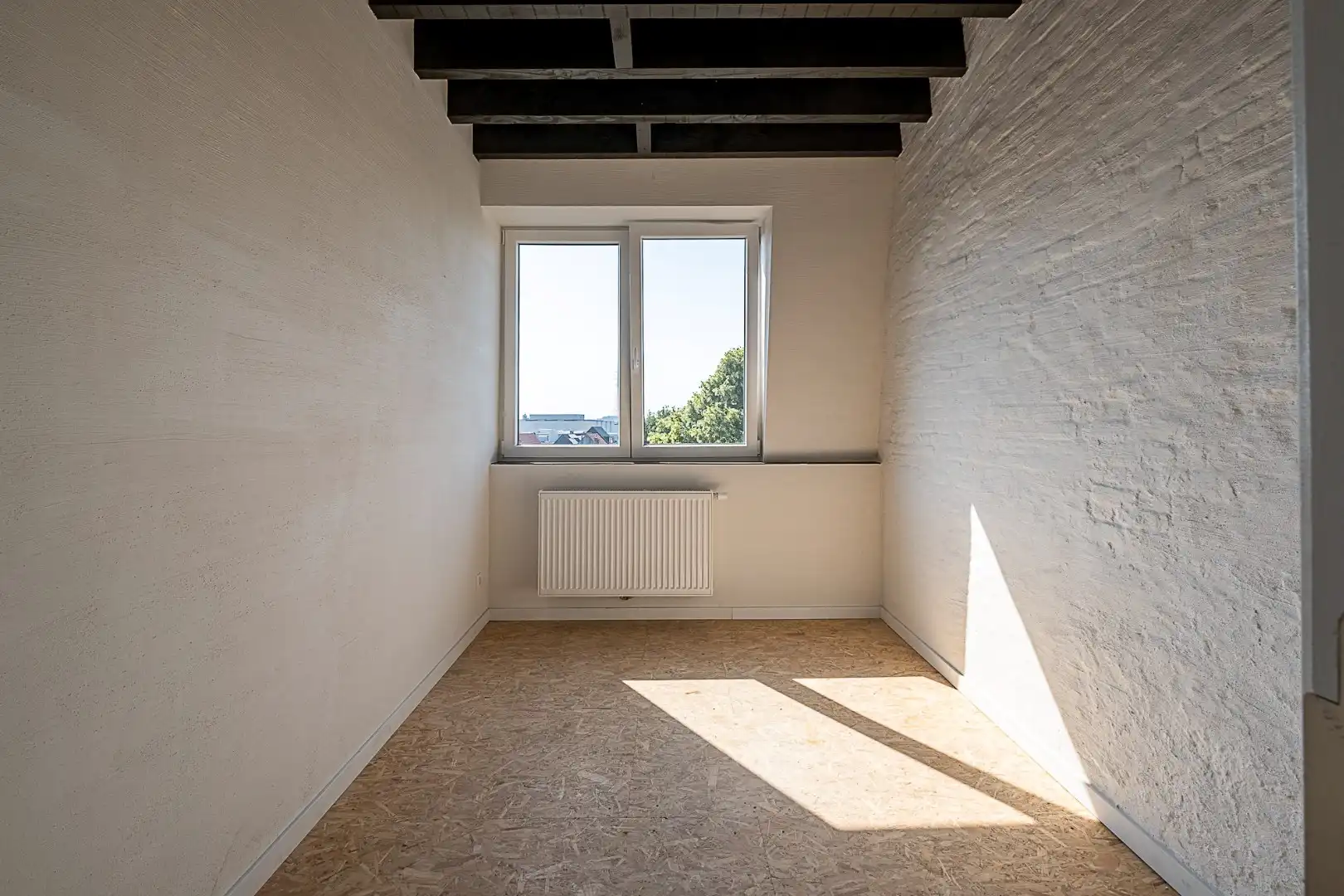 Genieten op hoogte: lichtrijk dakappartement met terras foto 11