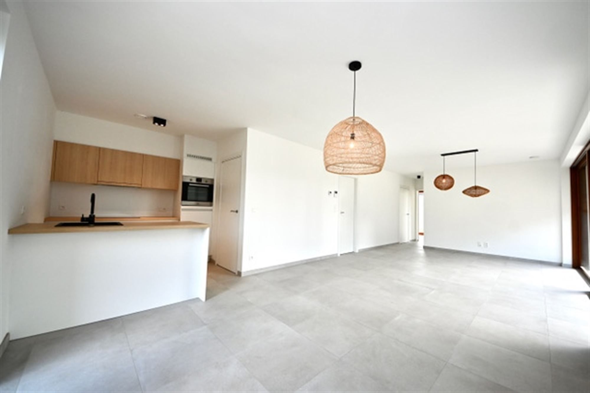 Appartement met 2 slaapkamers, tuin en staanplaats.  foto {{pictureIndex}}