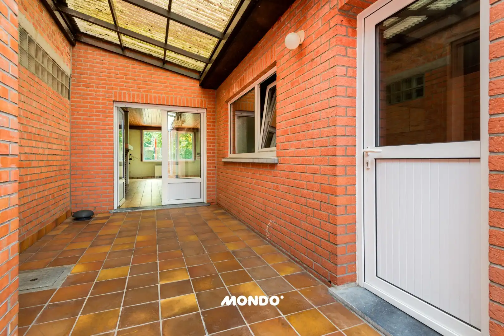 Veelzijdige rijwoning met tuin, binnenkoer en uitbouwmogelijkheden te Opwijk! foto 13
