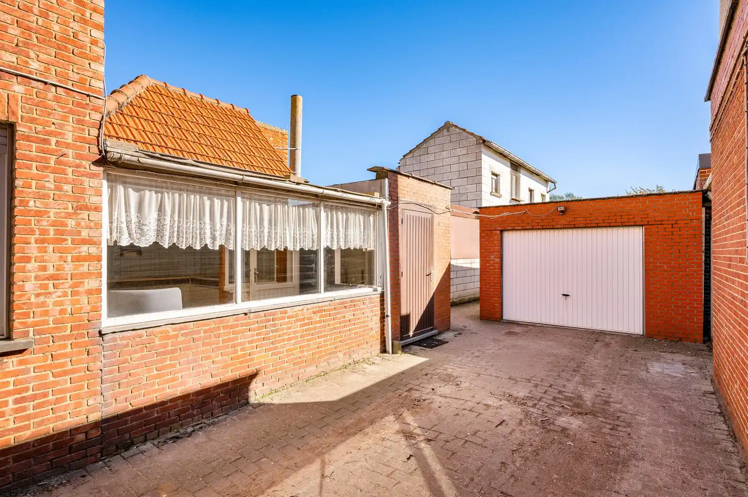 Te renoveren woning met garage en diepe tuin. foto 31