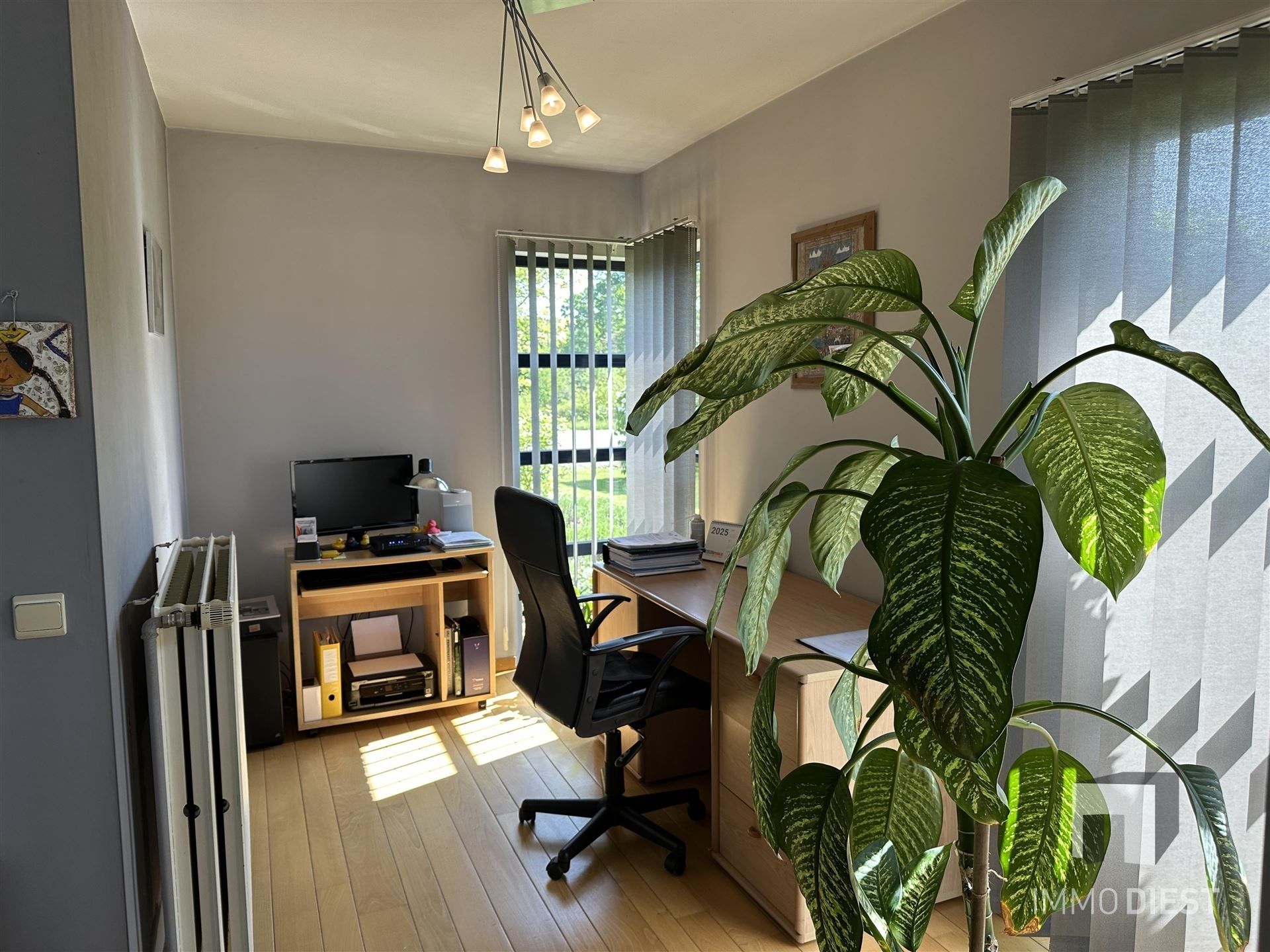 Instapklare woning met zicht op agrarisch gebied - bureau + 3 slpks foto 7