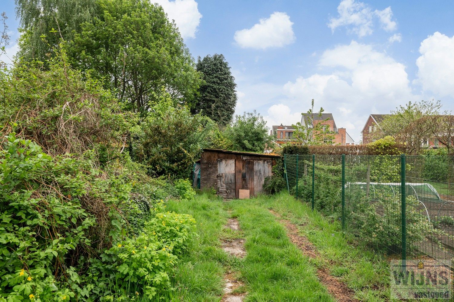 TE RENOVEREN WONING MET ACHTERUITGANG IN HET CENTRUM VAN EMBLEM foto 24