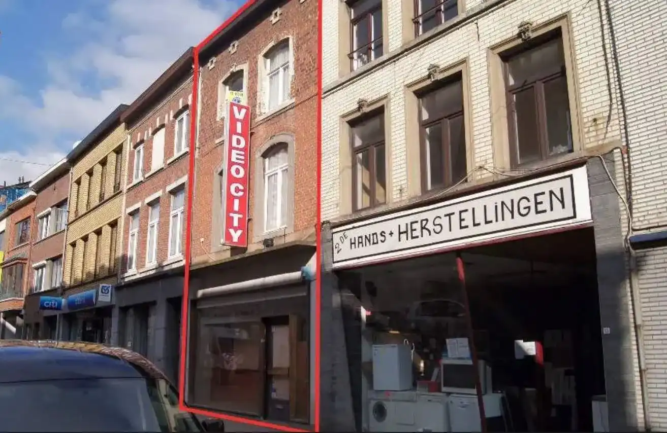 Hoofdfoto van de publicatie: In het centrum gelegen handelspand met woonst