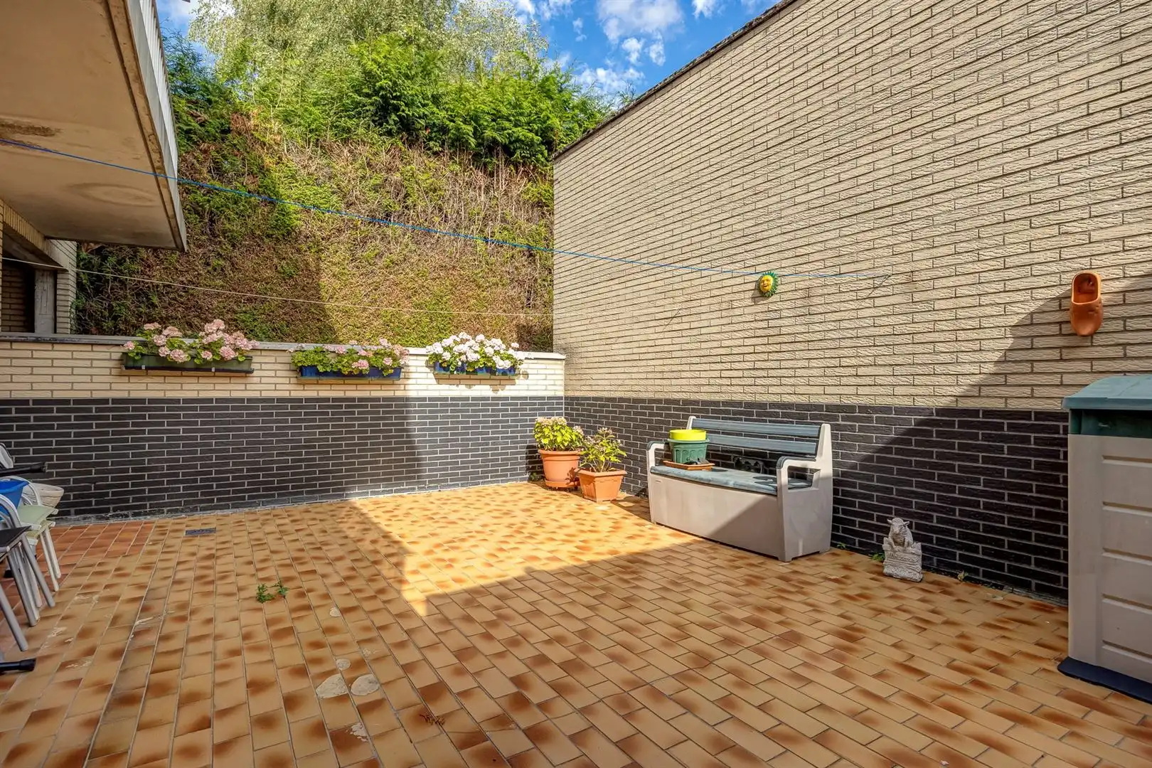 Opbrengsteigendom met 5 appartementen en garages foto 40