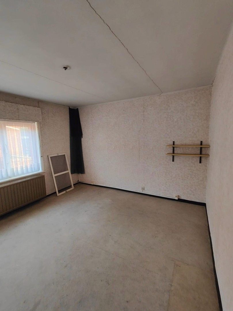 Woning met loods en voormalige showroom foto 12