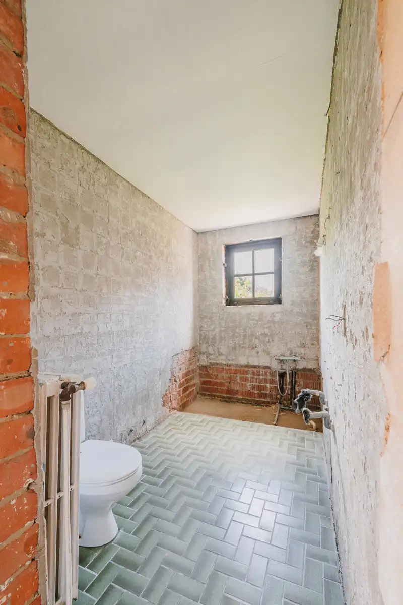 Gelijkvloerse renovatiewoning met groot potentieel foto 14