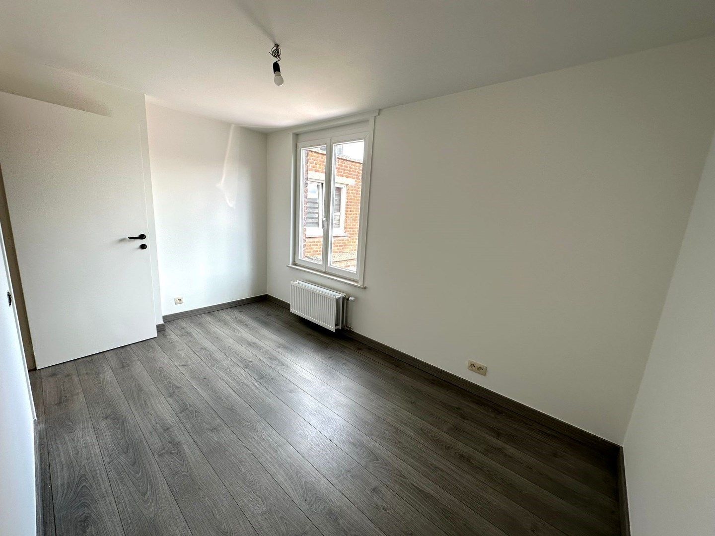 Instapklare en gezellige woning met tuin in het centrum van Roeselare foto 5