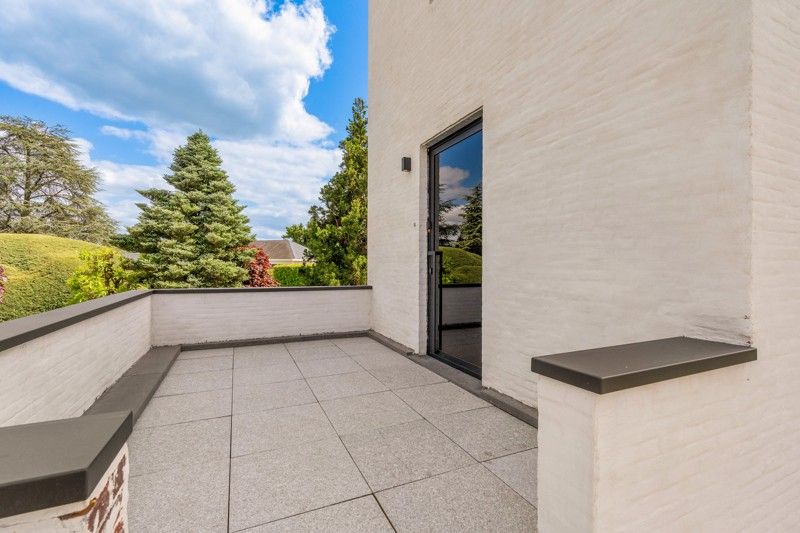 Zeer ruim en stijlvol penthouse met tuin en garage foto 3