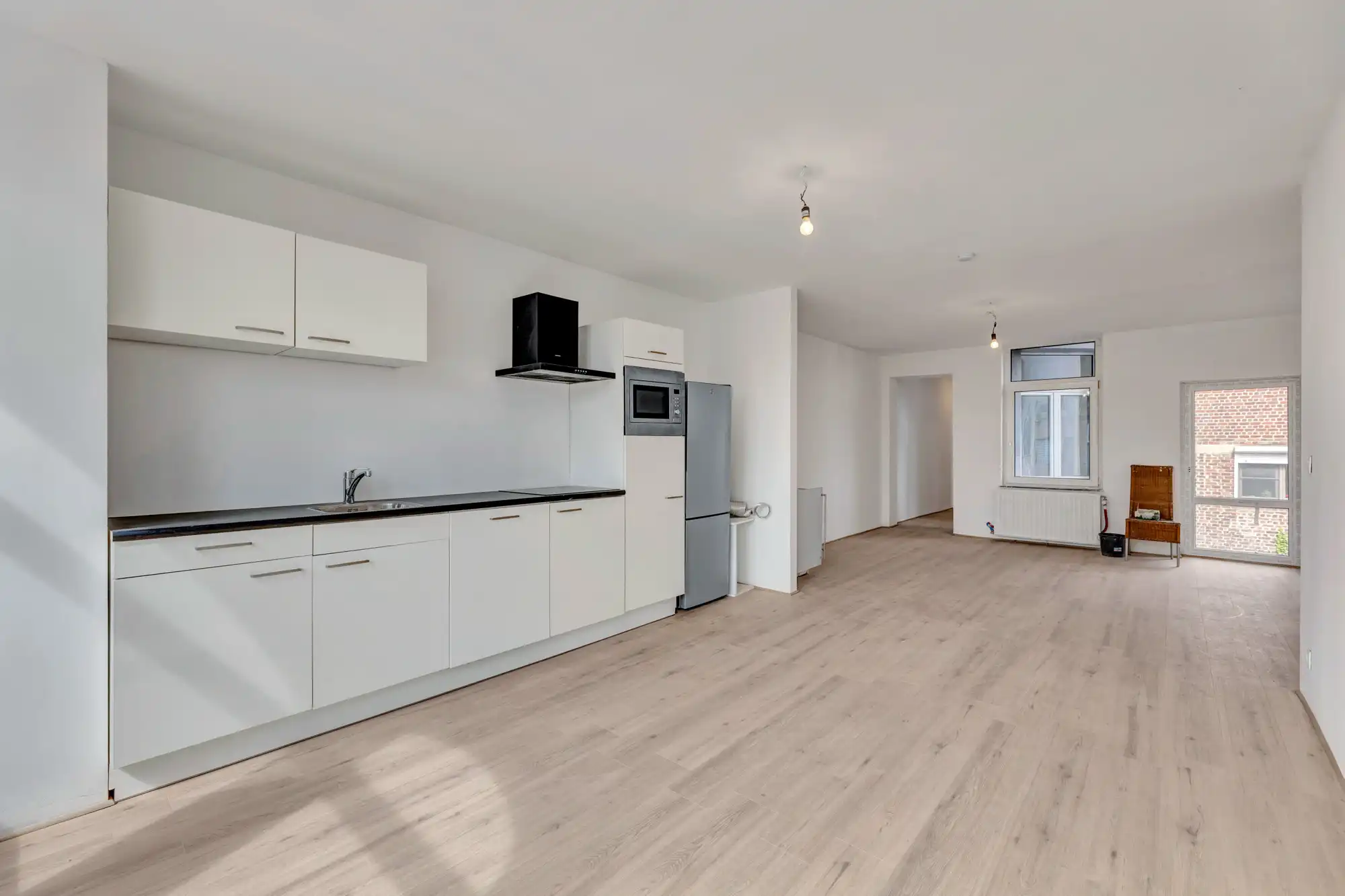 Gerenoveerd handelshuis op strategische locatie te Dilbeek! foto 4