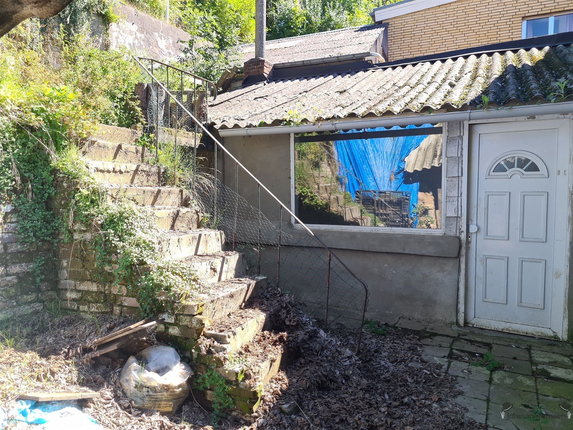 Op te knappen woning met veel potentieel in Tongeren foto 13