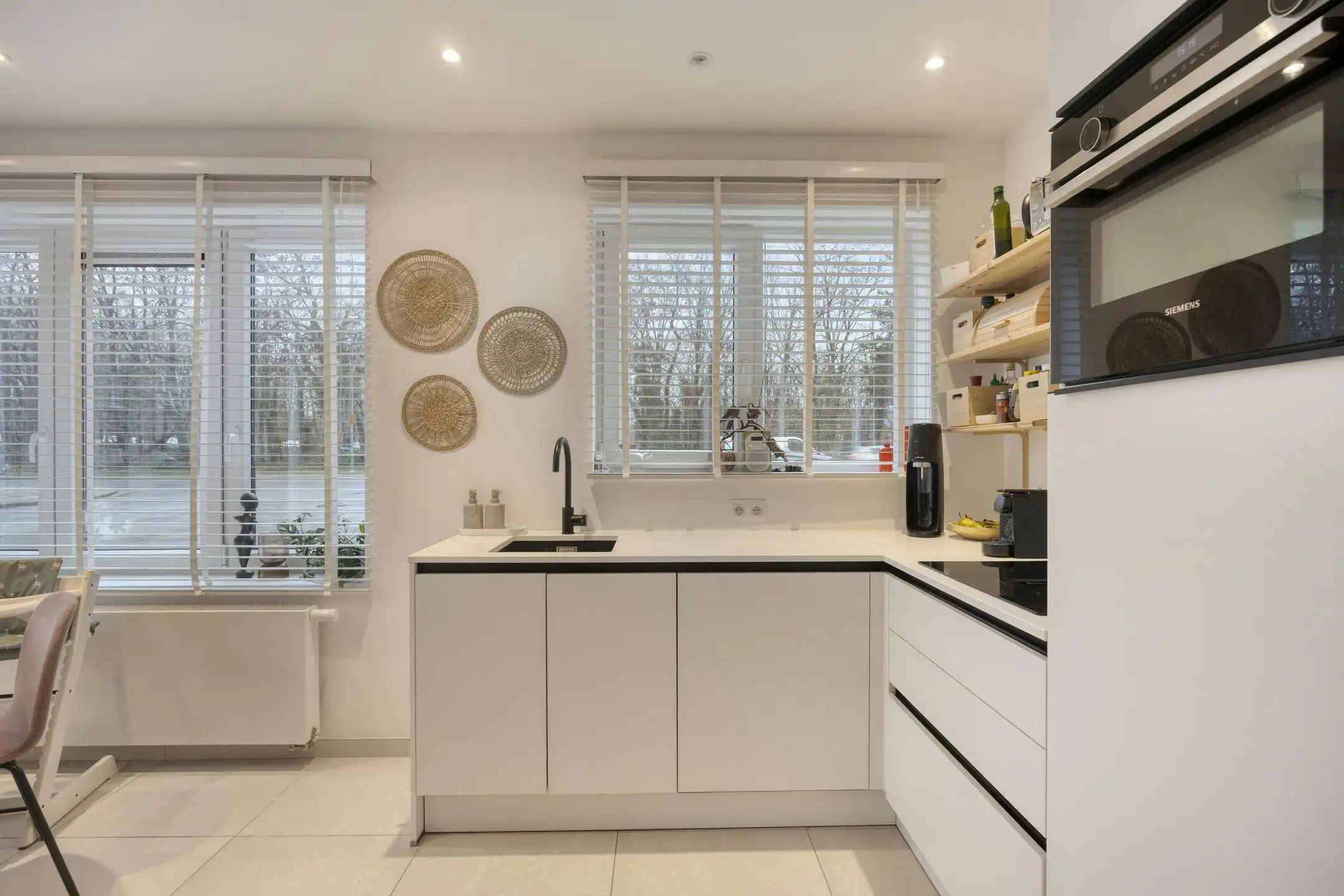 Gelijkvloers appartement met prachtige zuid-tuin en garage foto 4