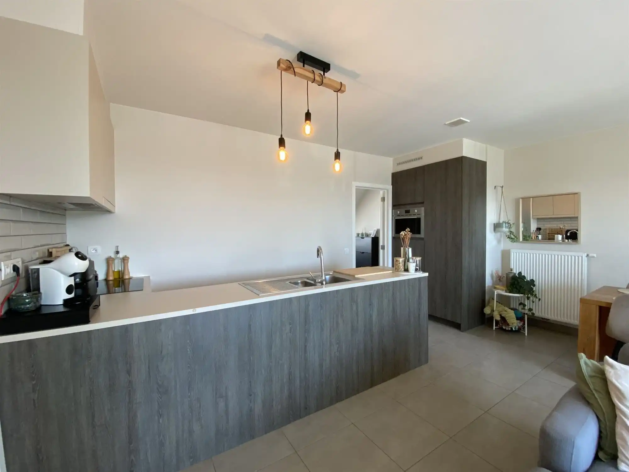 Prachtig energiezuinig dakappartement met 2 slaapkamers, ruim zonovergoten terras en garage in hartje Ertvelde foto 5