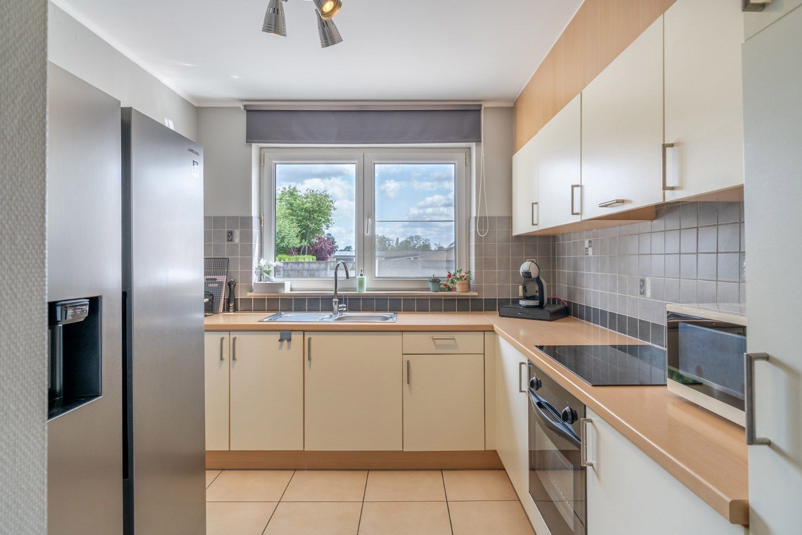 Verzorgd, degelijk en betaalbaar appartement met ruime kelder en inpandige garage foto 12