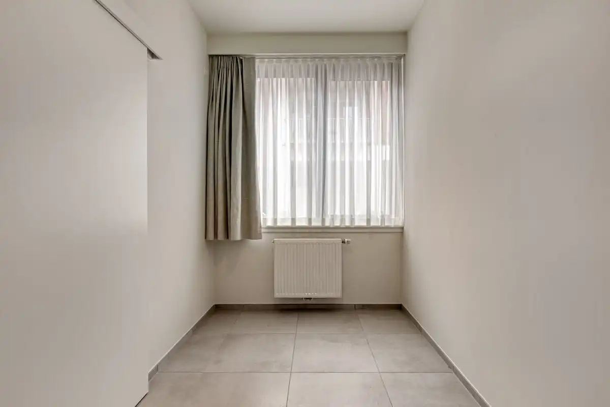 Assistentiewoning met 2 slaapkamers te koop in centrum Kortrijk! foto 6