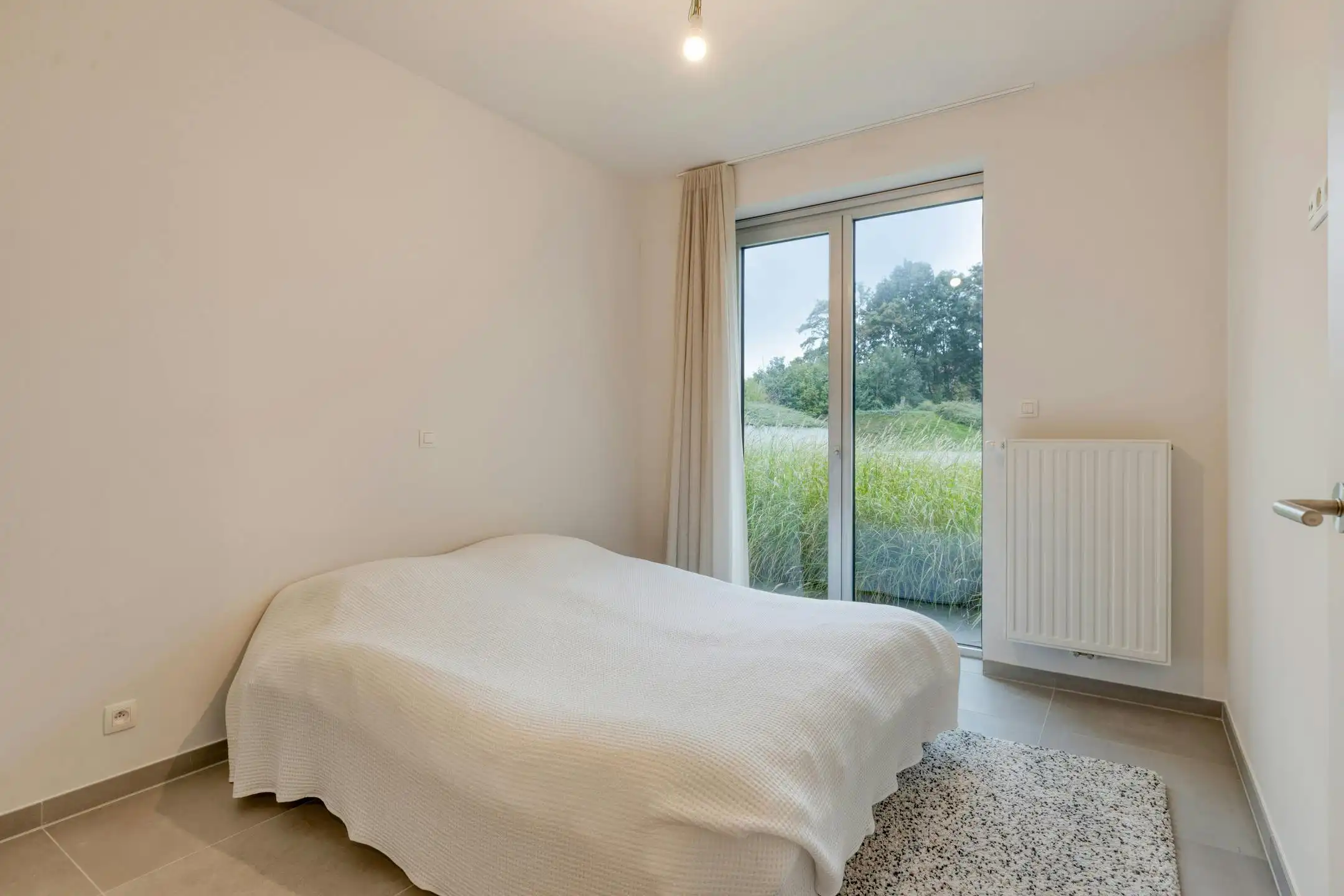 Instapklaar appartement in parktuin nabij hartje Roeselare! foto 13