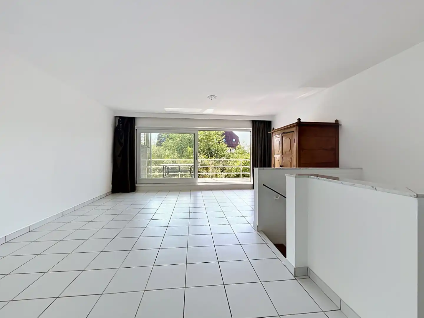 Ruim duplex appartement met 4 slaapkamers en 2 badkamers foto 11