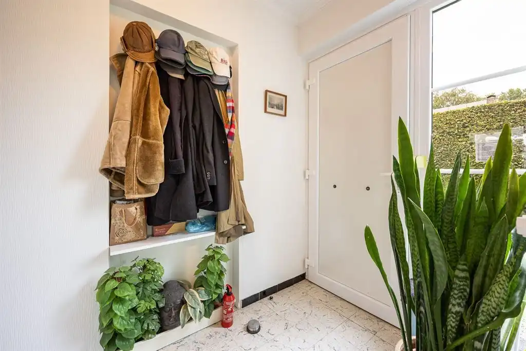 Te vernieuwen gelijkvloerse woning foto 8