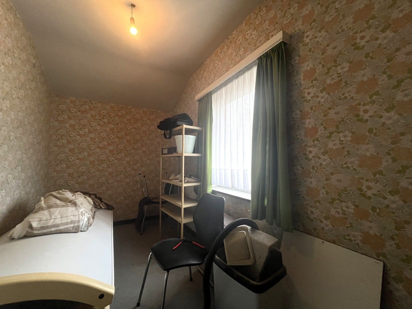 Halfopen woning met zonnige tuin foto 8