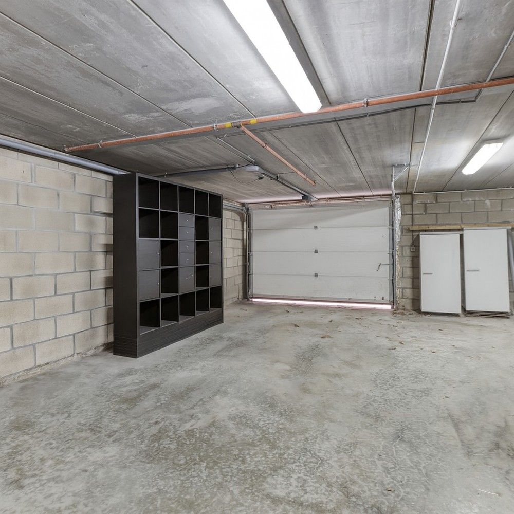 Instapklare en lichtrijke duplex met terras, garage én drie slaapkamers foto 31