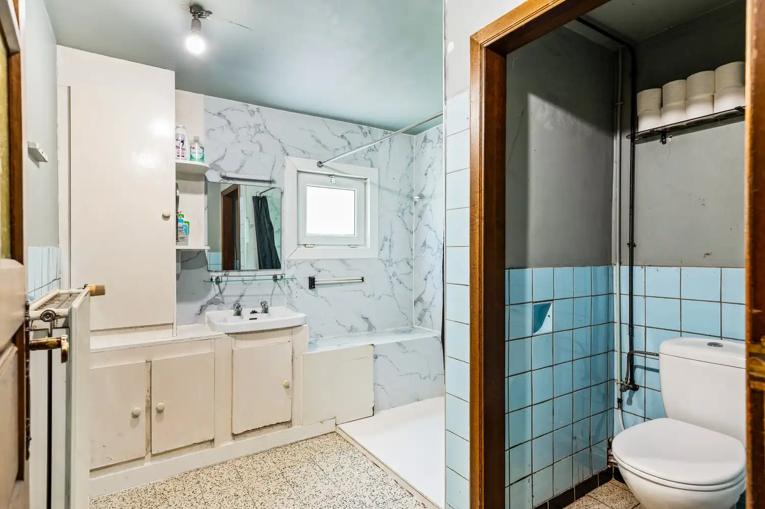 Te renoveren woning met veel potentieel in Ranst! foto 11